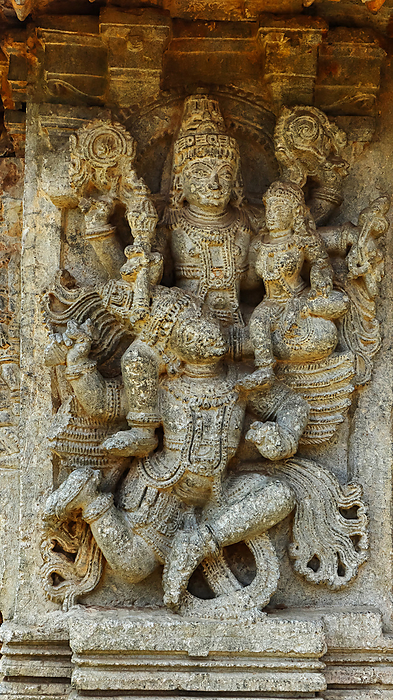 Sculpture of Lord Vishnu with Goddess Lakshmi on his shoulders, Mallikarjuna Temple, Basaralu, Mandya, Karnataka, India. Sculpture of Lord Vishnu with Goddess Lakshmi on his shoulders, Mallikarjuna Temple, Basaralu, Mandya, Karnataka, India., by Zoonar RealityImages