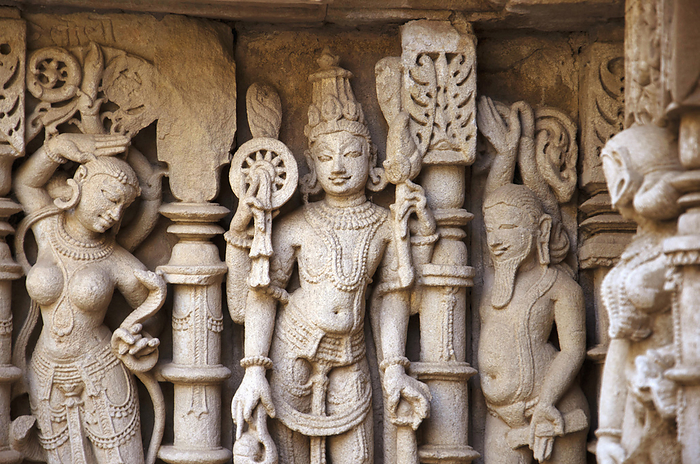 Carved idols on the inner wall of Rani ki vav, an intricately constructed stepwell on the banks of Saraswati River. Memorial to an 11th century AD King Bhimdev I. Built as inverted Vishnu temple with seven levels of stairs and holds more than 500 principa Carved idols on the inner wall of Rani ki vav, an intricately constructed stepwell on the banks of Saraswati River. Memorial to an 11th century AD King Bhimdev I. Built as inverted Vishnu temple with seven levels of stairs and holds more than 500 principa, by Zoonar RealityImages