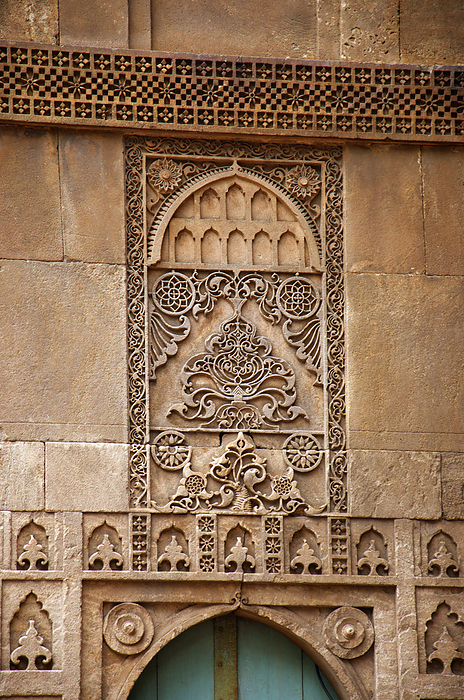 Carving details on the outer wall of the Sidi Sayeed Ki Jaali  Mosque , Built in 1573, Ahmedabad, Gujarat, India Carving details on the outer wall of the Sidi Sayeed Ki Jaali  Mosque , Built in 1573, Ahmedabad, Gujarat, India, by Zoonar RealityImages