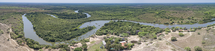 Panoramic areal view of typical Pantanal landscape, meandering tropical river through rainforest and Panoramic areal view of typical Pantanal landscape, meandering tropical river through rainforest and, by Zoonar Uwe Bergwitz