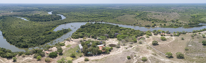 Panoramic areal view of typical Pantanal landscape, meandering tropical river through rainforest and Panoramic areal view of typical Pantanal landscape, meandering tropical river through rainforest and, by Zoonar Uwe Bergwitz