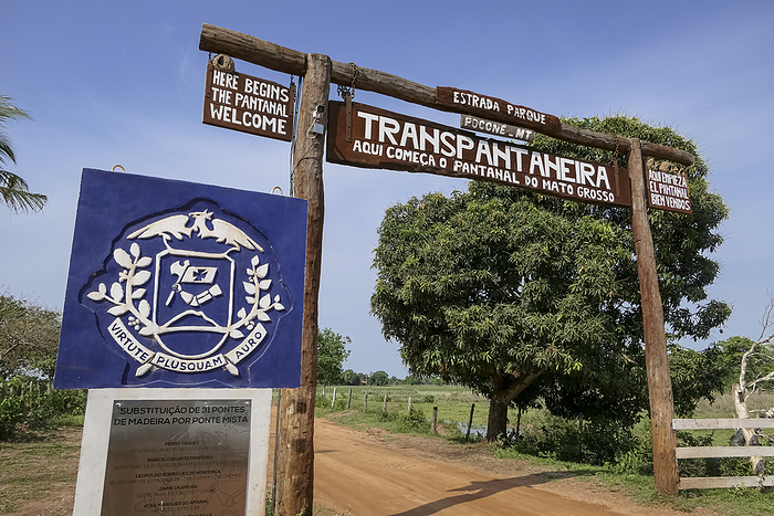 Entrance of the famous Transpantaneira road  here begins the Pantanal  with government emblem  more Entrance of the famous Transpantaneira road  here begins the Pantanal  with government emblem  more, by Zoonar Uwe Bergwitz
