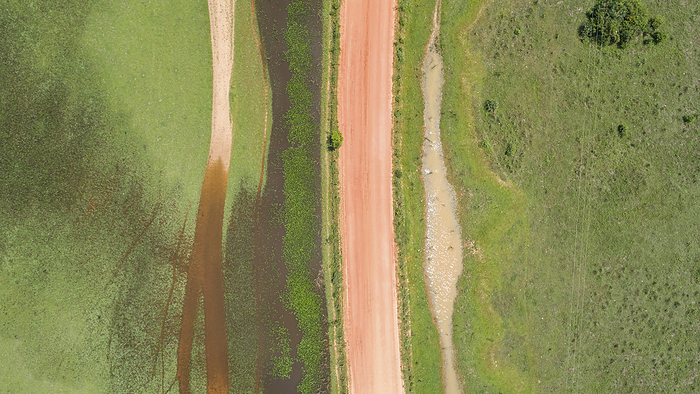 Close up aerial view of Transpantaneira dirt road, Pantanal Wetlands, Brazil Close up aerial view of Transpantaneira dirt road, Pantanal Wetlands, Brazil, by Zoonar Uwe Bergwitz