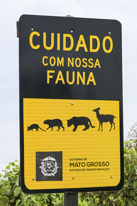 Road sign  Road sign Care of our wildlife Government of Mato Grosso, State of transformation, Transpantaneira, by Zoonar Uwe Bergwitz