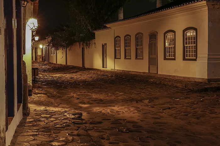Atmospheric night view of illuminated street and buildings in historical center of Paraty, Brazil, Unesco World Heritage Atmospheric night view of illuminated street and buildings in historical center of Paraty, Brazil, Unesco World Heritage, by Zoonar Uwe Bergwitz