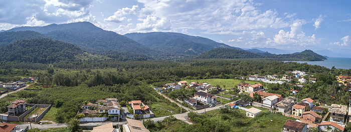 Panoramic aerial view of Jabaquara, Paraty with buildings, Bay Carioca, mountains, islands and blue Panoramic aerial view of Jabaquara, Paraty with buildings, Bay Carioca, mountains, islands and blue, by Zoonar Uwe Bergwitz