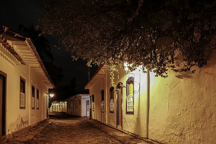 Atmospheric night view of illuminated street and buildings in historical center of Paraty, Brazil, U Atmospheric night view of illuminated street and buildings in historical center of Paraty, Brazil, U, by Zoonar Uwe Bergwitz
