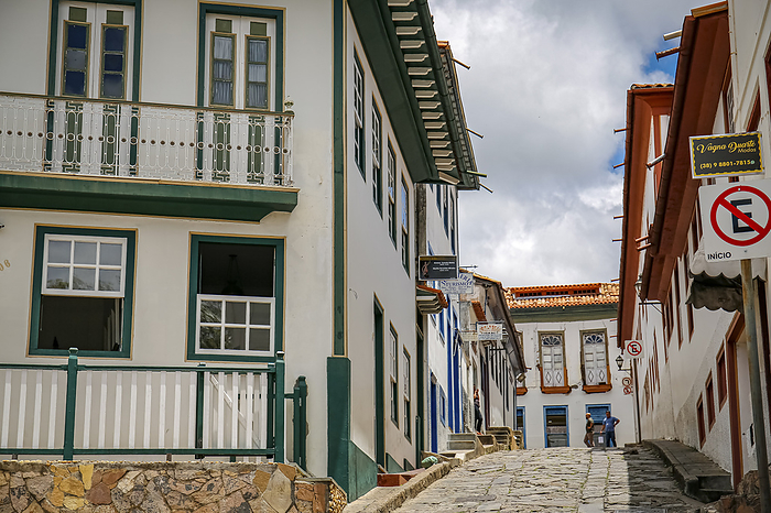 View to a cobblestone street framed by pretty colonial houses in Diamantina, Minas Gerais, Brazil View to a cobblestone street framed by pretty colonial houses in Diamantina, Minas Gerais, Brazil, by Zoonar Uwe Bergwitz