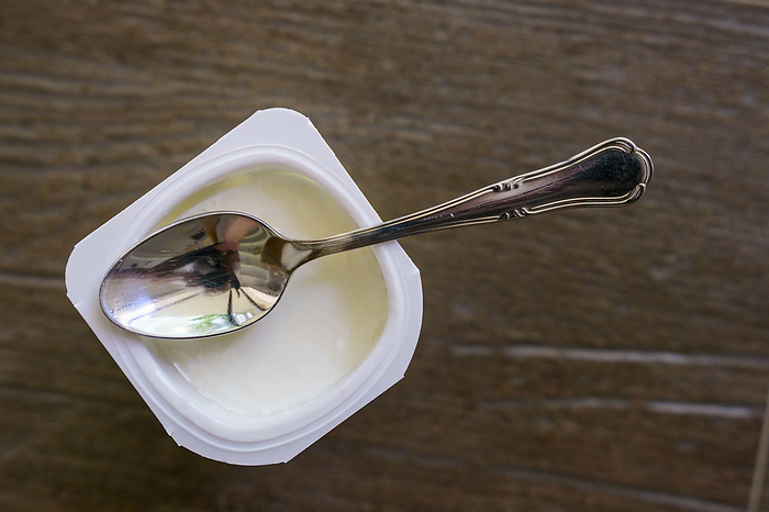 natural yogurt and teaspoon natural yogurt and teaspoon, by Zoonar TOLO BALAGUER