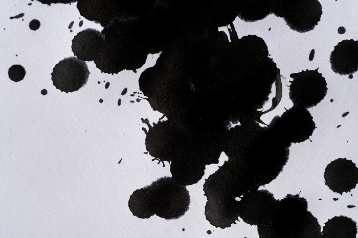 Spattering black ink