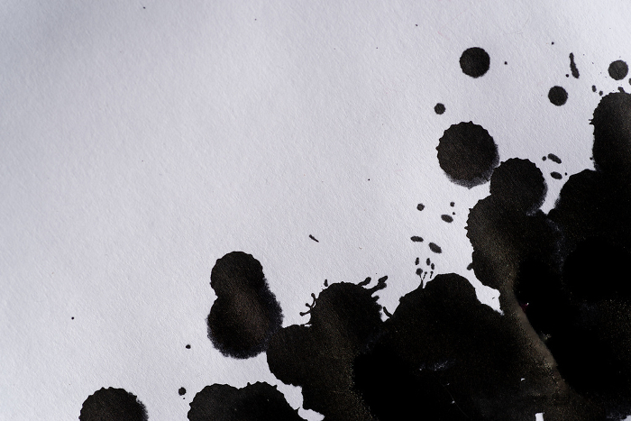 Spattering black ink