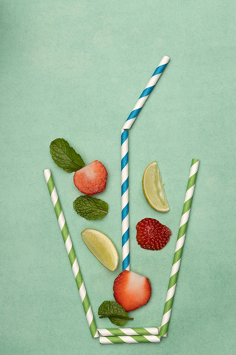 Summer feel concept. Cup of straw with Strawberry, mint and lemon Summer feel concept. Cup of straw with Strawberry, mint and lemon, by Zoonar RealityImages