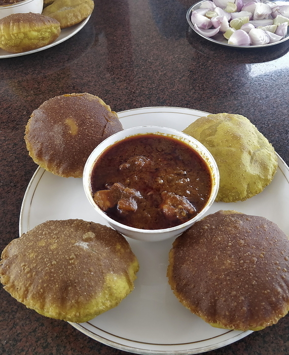 Famous Kombdi vade, Spicy Chicken dish, Kokan, Maharashtra, India Famous Kombdi vade, Spicy Chicken dish, Kokan, Maharashtra, India, by Zoonar RealityImages