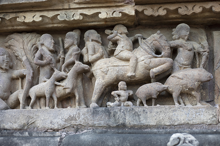 Sculpture of people hunting, Khajuraho, Madhya Pradesh, India Sculpture of people hunting, Khajuraho, Madhya Pradesh, India, by Zoonar RealityImages