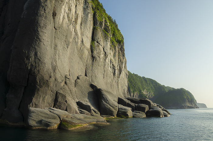 Cliff scenery of Utoro Shiretoko Peninsula, Hokkaido, Japan This photo was taken on the Shiretoko Peninsula, a World Natural Heritage site. From the Shiretoko sightseeing boat
