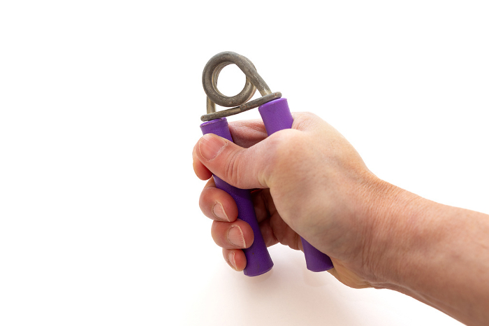 Grip strength training using hand grips
