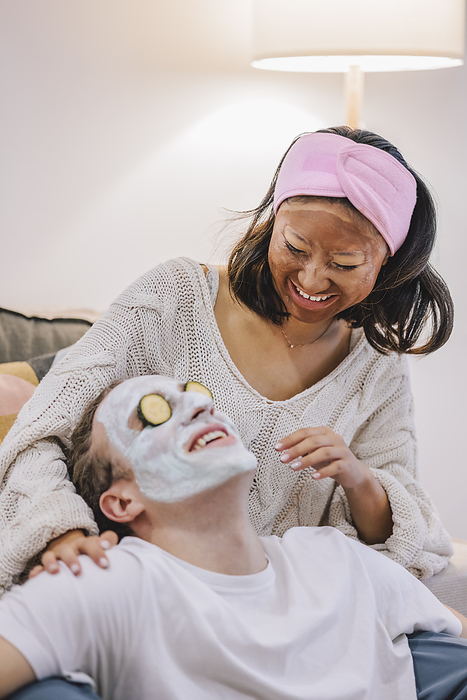Couple doing skincare and having fun at home