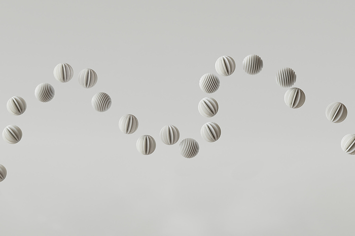 3D render of striped spheres floating against white background