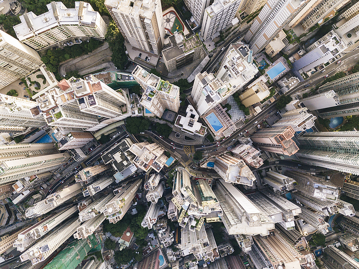 Aerial view of Hong Kong Modern tall buildings with winding road in Hong Kong city