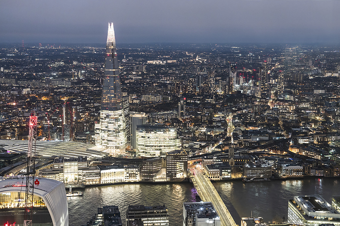 London, United Kingdom Illuminated Shard building near Thames river in London city
