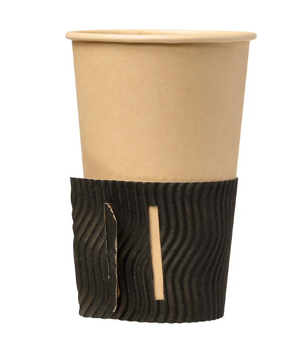 Empty brown cup for tea and coffee on a white isolated background, corrugated stand Empty brown cup for tea and coffee on a white isolated background, corrugated stand