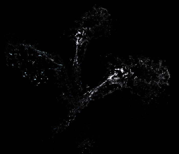 Long stream of fresh transparent water isolated on black background. Splash and drops Long stream of fresh transparent water isolated on black background. Splash and drops