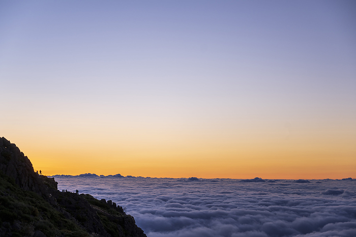 Tourists at sunrise above the clouds, Pico do Areeiro, Madeira, Portugal, Europe, by Axel Schmies