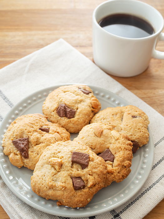 Homemade nut chocolate oatmeal cookies and hot coffee
