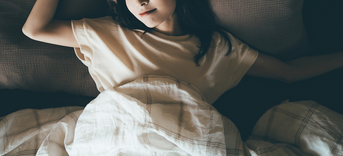 Japanese woman sleeping in bed (People)