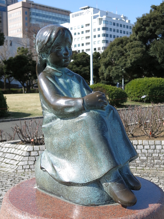 Statue of a girl wearing red shoes in Yamashita Park, Naka-ku, Yokohama