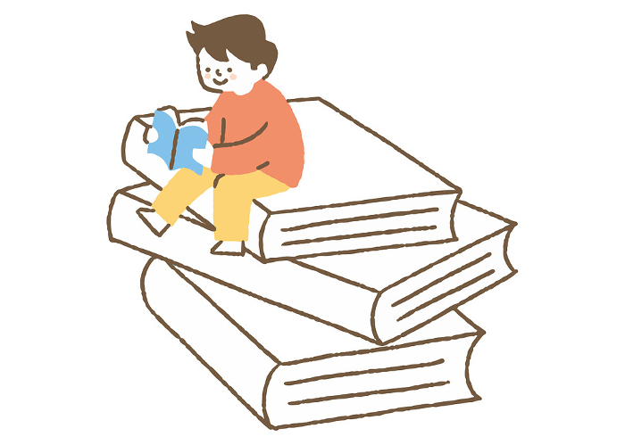 Boy reading on a big book_color