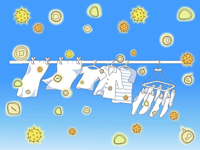 Clip art image of laundry dried outdoors under a blue sky with pollen.