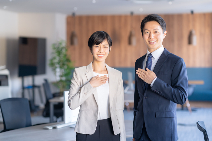Japanese businessmen and women in a meeting (People)