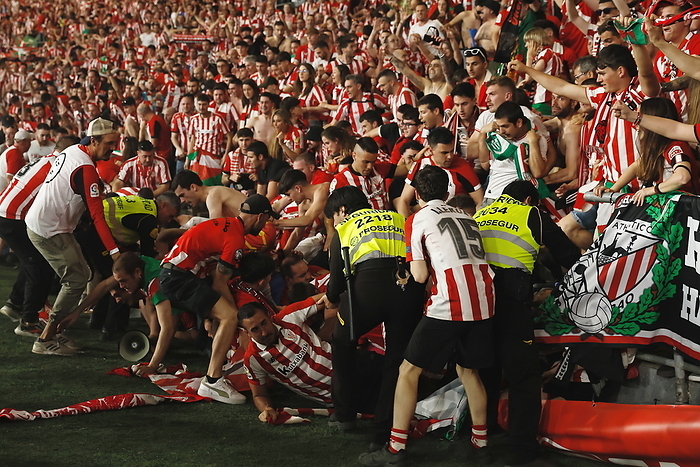 2023 24 Spanish King s Cup Final Bilbao wins for the first time in 40 years Bilbao fans, APRIL 6, 2024   Football   Soccer : Bilbao fans collapse onto the pitch as they rush to the fence after the Spanish  Copa del Rey  final match between Athletic Bilbao 1  PK 4 2 1 RCD Mallorca at the Estadio La Cartuja in Sevilla, Spain.  Photo by Mutsu Kawamori AFLO 