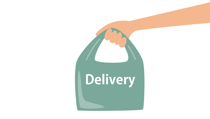 Clip art of hand holding delivery bag