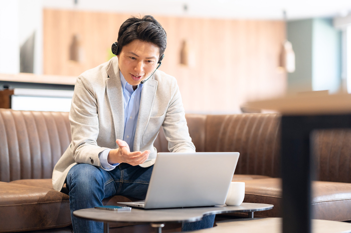 Middle Japanese man in online meeting (People)