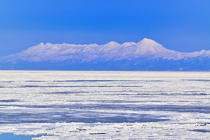 Shiretoko mountain range on drift ice Hokkaido At Hama Koshimizu, Koshimizu Town