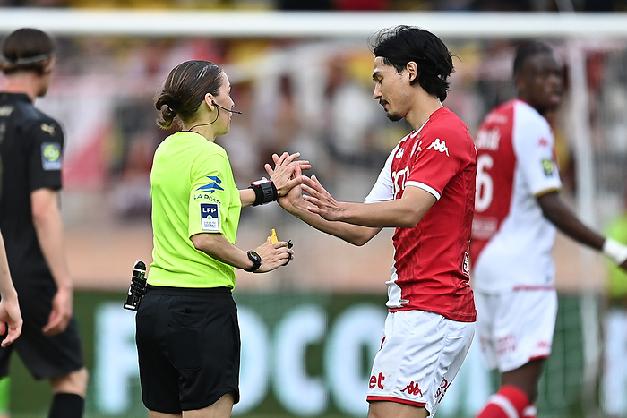 AS Monaco v Stade Rennais FC   Ligue 1 Uber Eats Takumi Minamino of AS Monaco speaks with Referee Stephanie Frappart during the Ligue 1 Uber Eats match between AS Monaco and Stade Rennais FC at Stade Louis II on April 7, 2024 in Monaco, Monaco.   WARNING  This Photograph May Only Be Used For Newspaper And Or Magazine Editorial Purposes. May Not Be Used For Publications Involving 1 player, 1 Club Or 1 Competition Without Written Authorisation From Football DataCo Ltd. For Any Queries, Please Contact Football DataCo Ltd on  44  0  207 864 9121