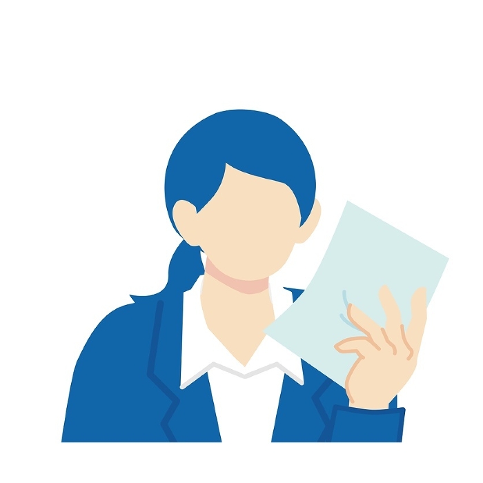 Woman in navy blue suit holding documents and looking through them