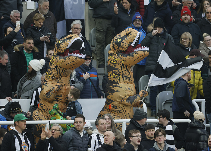 Newcastle United v Everton FC   Premier League Fans wearing dinosaur costumes during the Premier League match between Newcastle United and Everton FC at St. James Park on April 2, 2024 in Newcastle upon Tyne, England.   WARNING  This Photograph May Only Be Used For Newspaper And Or Magazine Editorial Purposes. May Not Be Used For Publications Involving 1 player, 1 Club Or 1 Competition Without Written Authorisation From Football DataCo Ltd. For Any Queries, Please Contact Football DataCo Ltd on  44  0  207 864 9121