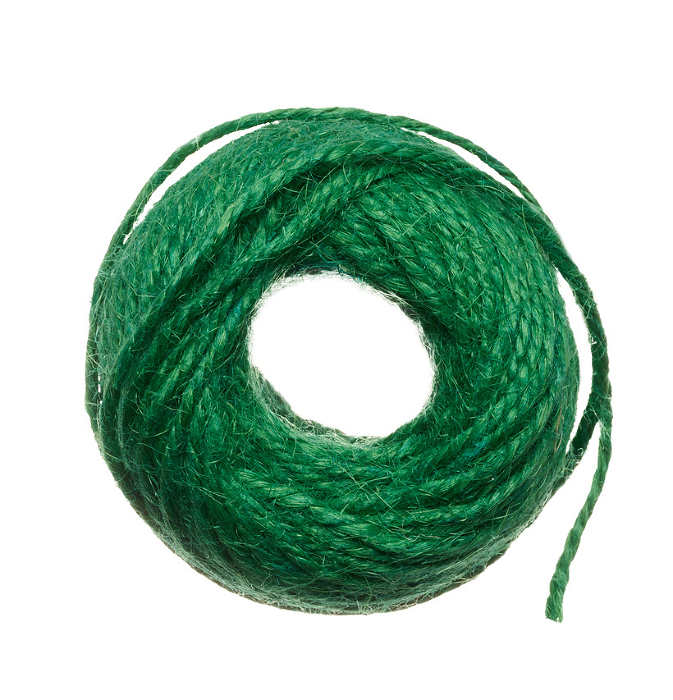 Skein of green thread on a white isolated background, top view Skein of green thread on a white isolated background, top view