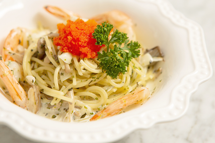 Cream pasta with tobiko topping