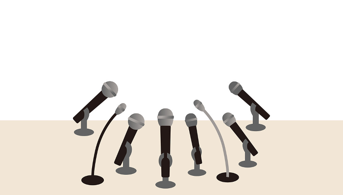 Illustration of a table with many microphones