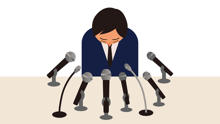 Illustration of a man apologizing in front of many microphones