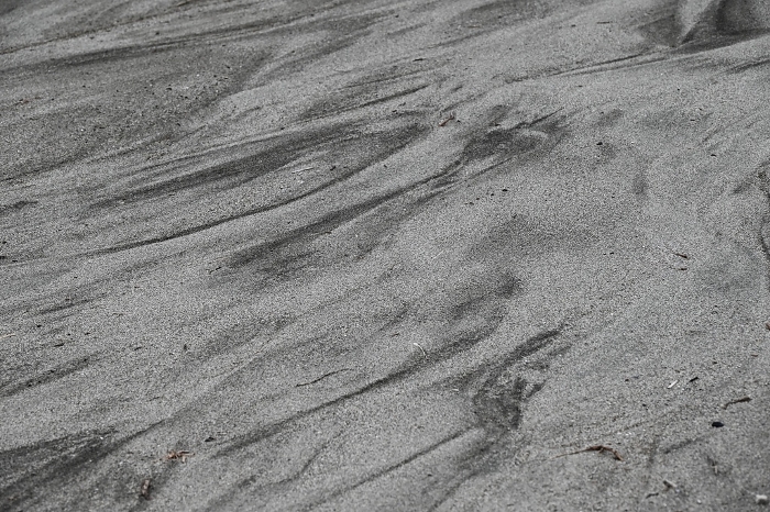Abstract and artistic scene created by sand on the beach by chance, beauty of nature.