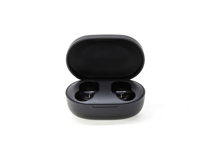 Front view of empty wireless earphone charging case