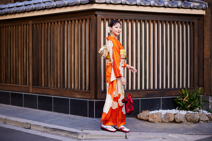 Smiling Japanese woman in furisode kimono