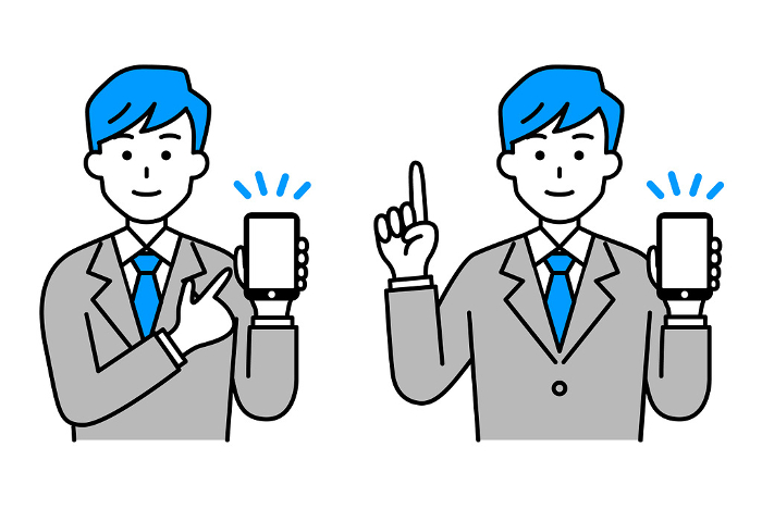A man in a suit holding a smartphone and explaining