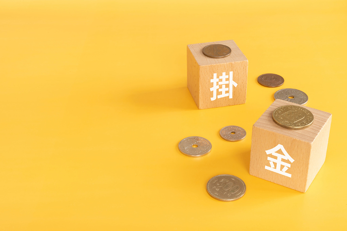 Blocks and money with letters of premiums