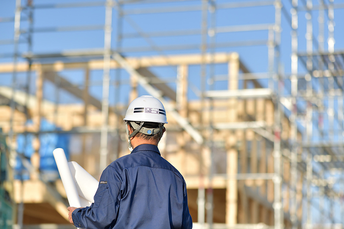 Site supervisor inspecting residential construction work